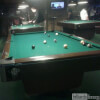 Shooting Pool at Barney's Billiard Saloon Spring, TX.