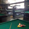 Playing pool at Billiard Hoàng of Seattle, WA