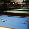 Shooting Pool at Billiards Cafe of Lodi, NJ
