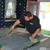 Shane Bouchard Applying Wax at the Slate Seams