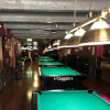Row of Pool Tables at Status Q Billiards of Brooklyn, NY
