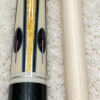 Forearm of a 2nd Gen BMC White Crusher Cue