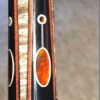 Forearm of a BMC SWBB 2B Cue with Orange on Grey Stain