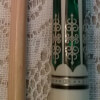 Forearm of a Green Meucci 21-3 Cue