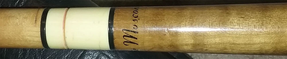 Identify pool cue with name Willie Mosconi on it